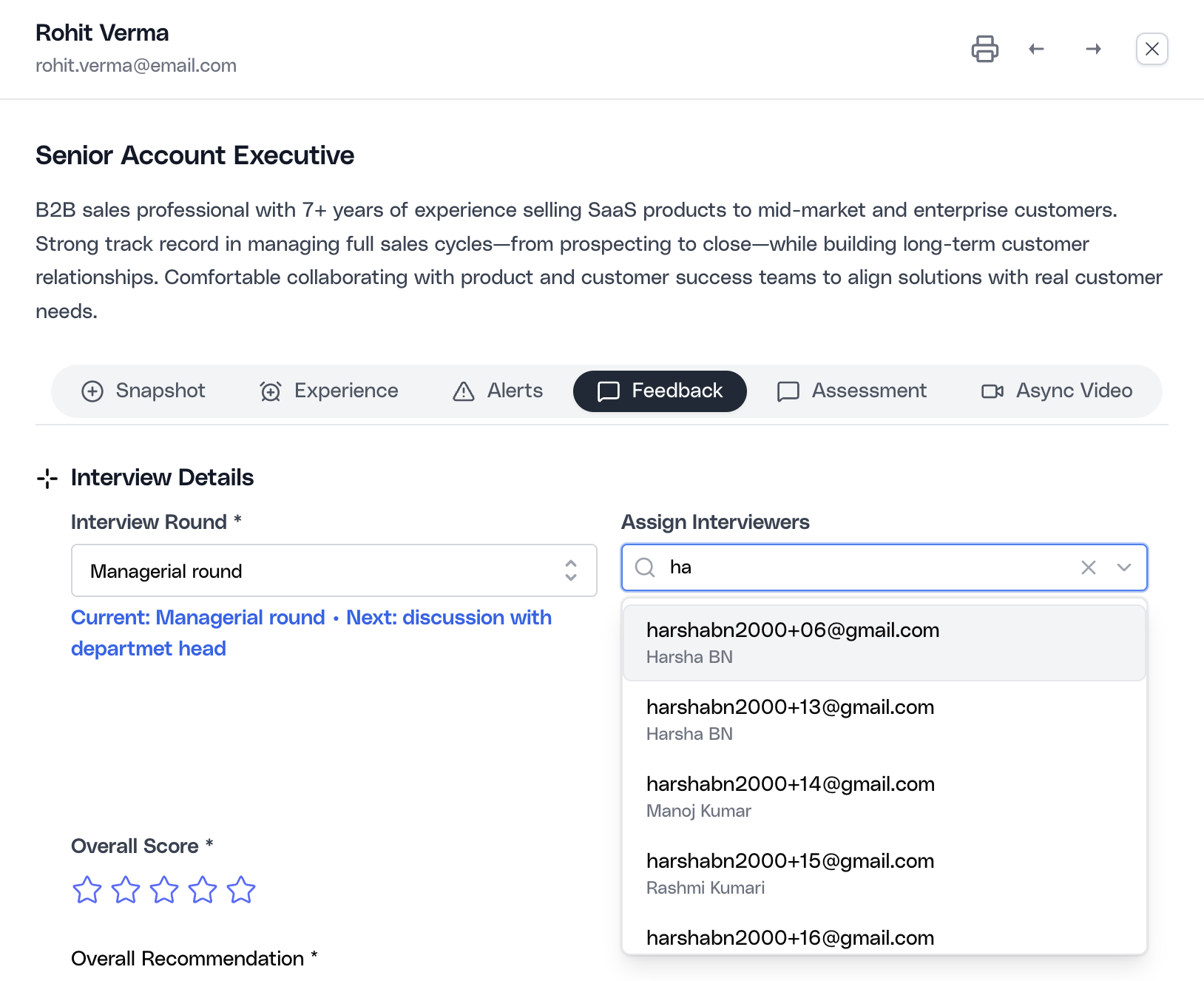Stage-change modal showing interviewer email assignment for a non-automated interview stage